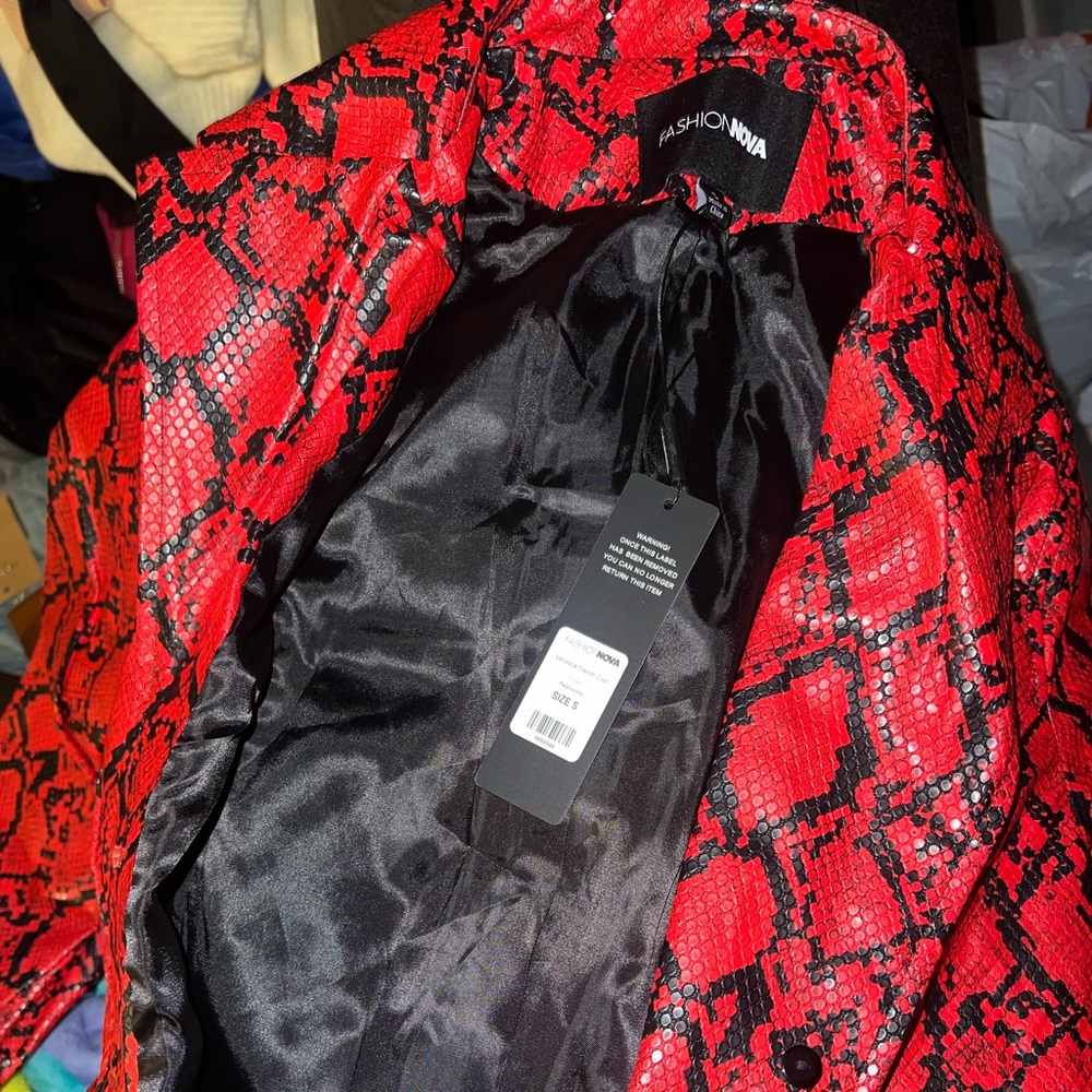 Fashion nova red snake print coat - pleather $25
New with tag